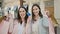 Two women customer holding shopping bags and credit card at street