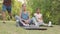 Two women doing stretching exercise at park