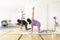 Two women doing yoga at home