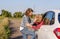 Two women fighting at the roadside