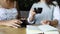 Two women friends drink coffee in cafe. Females talking and drinking latte.