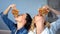 Two women greedily eating tasty pizza, fast food addiction, unhealthy diet