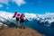 Two women hikers holding Canada flag at Garibaldi lake panorama ridge