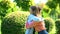 Two women hugging outdoor saying good-bye, friendship trusting relationship