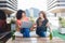 Two women with laptop and beer at the end of the day