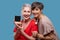 Two women looking involved while doing make up