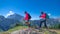 Two women in the mountains with anti virus mask