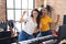 Two women musicians listening to music dancing at music studio