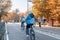 Two women in Muslim headscarves ride bicycles