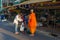 Two women receive morning blessing, Bangkok