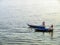 Two women rowing a boat