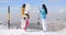 Two women snowboarders enjoying the winter view