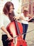 Two women strings duet playing