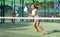 Two women tennis players playing padel