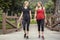 Two Women Walking and working out Together