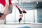 Two women wearing comfy leggings doing aerial yoga together