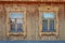 Two wood ornate windows in russian old style