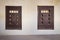 Two wooden arabesque ottoman era embedded cupboards with engraved decorations