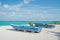 Two wooden blue color boats on the beach