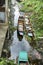 Two wooden boats moored in a natural canal