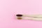 two wooden eco brushes with natural bristles