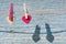 Two wooden hearts on the background of the old blue  textural wooden wall.