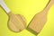 Two wooden kitchen spatulas. Top view. Close up