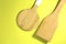 Two wooden kitchen spatulas. Top view. Close up