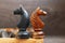 Two wooden knights in chess, retro and vintage object, game