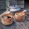 Two wooden mugs filled with coffee