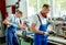 Two worker on work bench