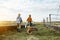 Two workers on the farmland outdoors