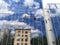 Two working climbers on a glass wall of a high-rise building