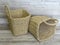 Two woven baskets made of straw, rattan, cane. Beautiful Handmade Woven Bamboo / Cane Basket.