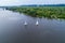 Two yachts are rafted along the Dnieper River. Sailing sport. Competitions on the water