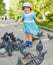 Two-year girl feeding doves