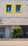 Two Yellow Architectural Design Windows In A Residential Apartment Development