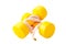 Two yellow dumbbells and tape measure isolated on the white back