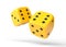 Two yellow rolling gambling dice in Flight on a white background