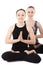 Two Yogi female partners in yoga Lotus Pose