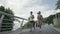 two young asian women running jogging outdoors