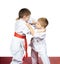 Two young athletes train judo sparring