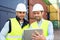 Two young attractives dockers working on the dock