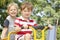 Two Young Boys Playing on Bike