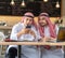 Two young businessman Arabian entrepreneur talking on mobile phone cell phone for good deal successful .Arab man surfing internet