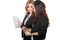 Two young businesswoman discuss with a clipboard, isolated