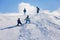 Two young children, siblings brothers, skiing in Austrian mountains on a sunny day