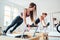 Two young females doing extended plank static strengthening core muscles exercise using pilates reformer machine in sport athletic