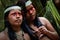 Two young girls from huaorani tribe in the amazon