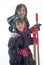 Two Young Girls Shoveling Snow